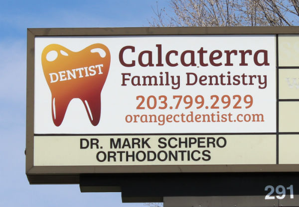 Calcaterra Family Dentistry sign in Orange visible from the Boston Post Road