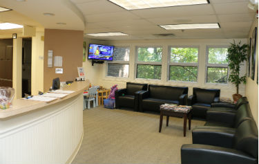 dentist reception area photo spacious and comfortable in Orange, CT