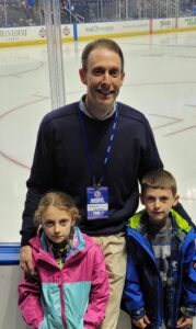 Sports Dentist Dr. Nick Calcaterra at a hockey game